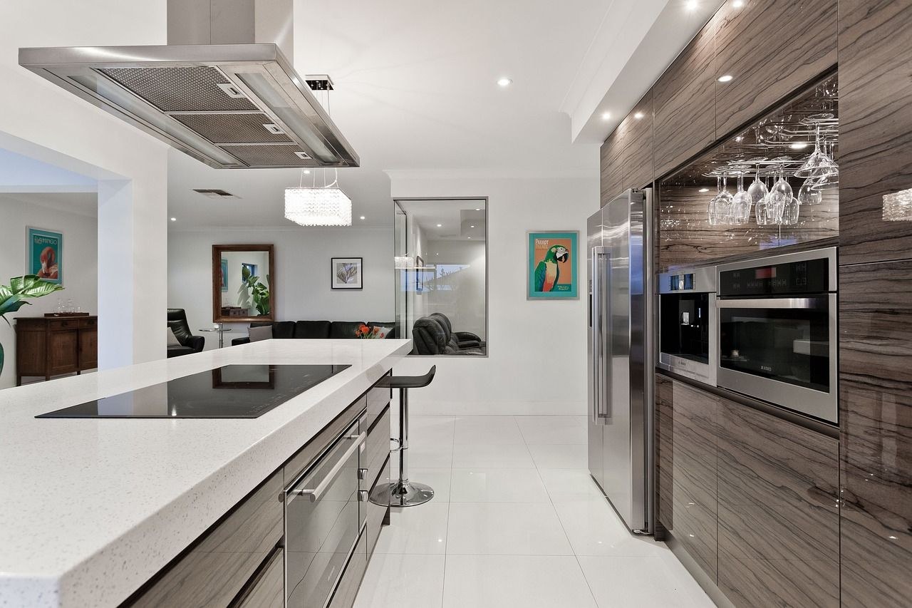 Modern kitchen with waterfall countertop and built-in appliances